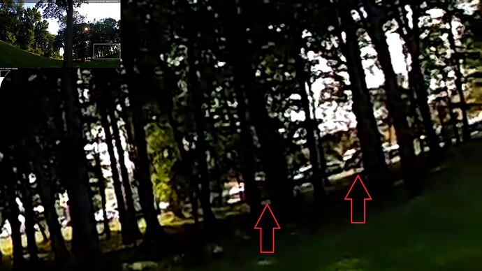 two  moving cars behind those threes