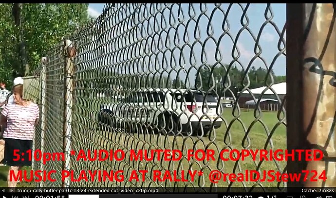 red hat guy woman at fence