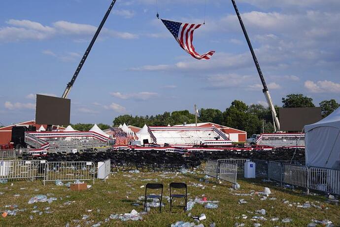 Trump stage left of center w barns