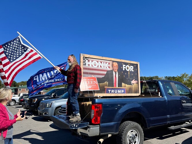art truck and trump sign