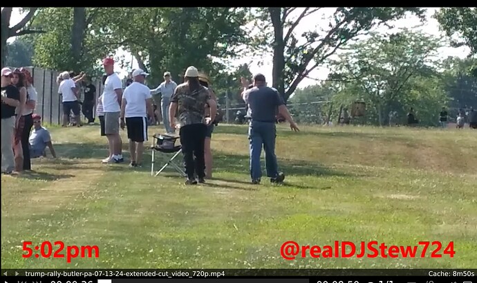 red hat guy 5 pm next to woman